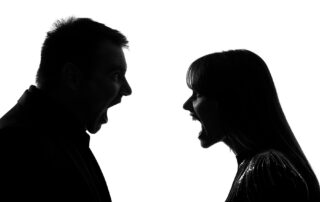 man and woman yelling, in profile, black and white high contrast, threats of violence